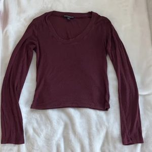 Brandy Melville burgundy loose long sleeve top.